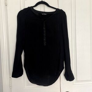 This is a loose extra small blouse from Express.